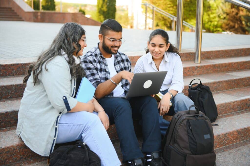 Group of Indian or Asian college students in the campus